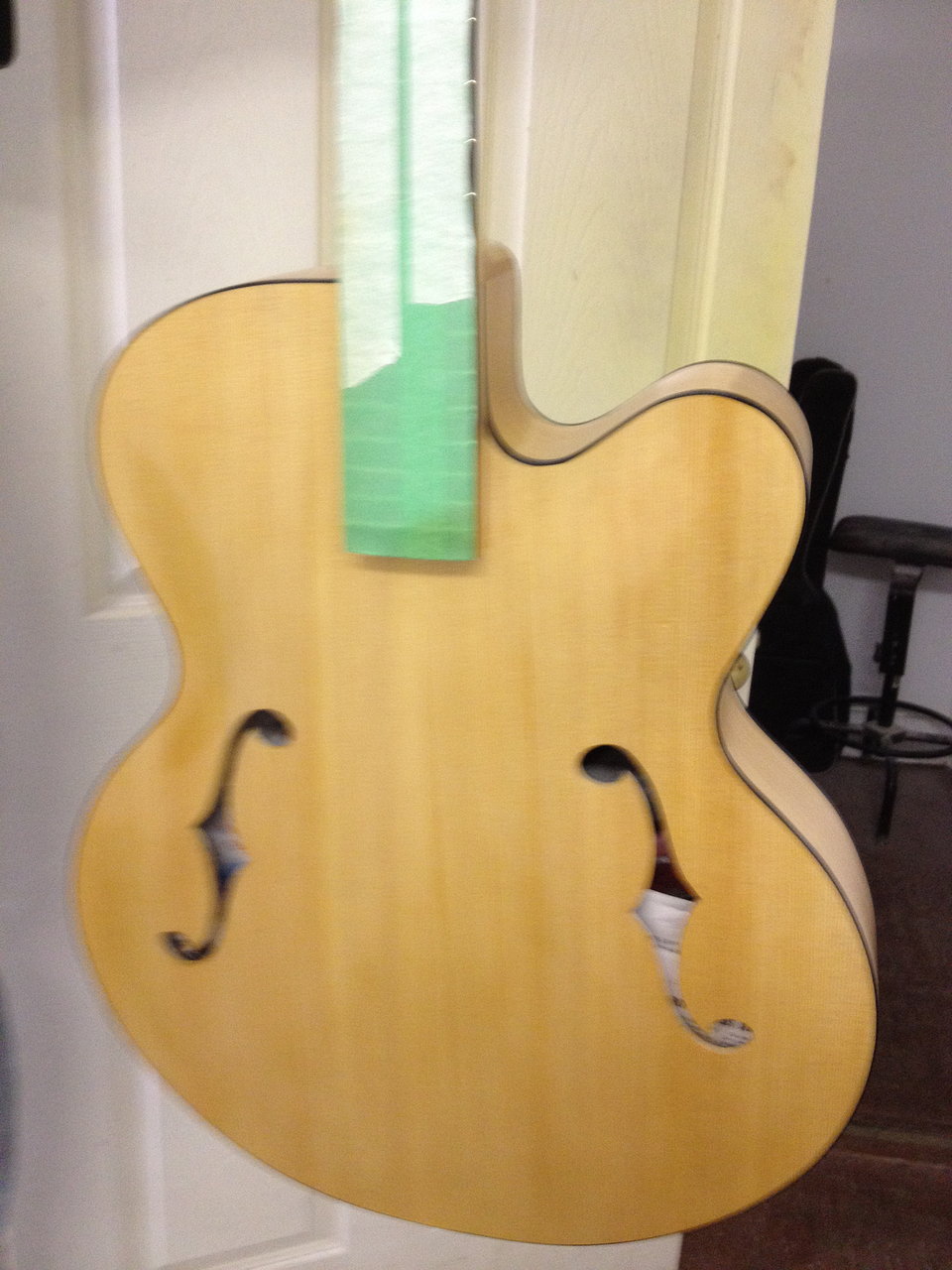 Handmade archtop jazz guitar taking shape in the workshop