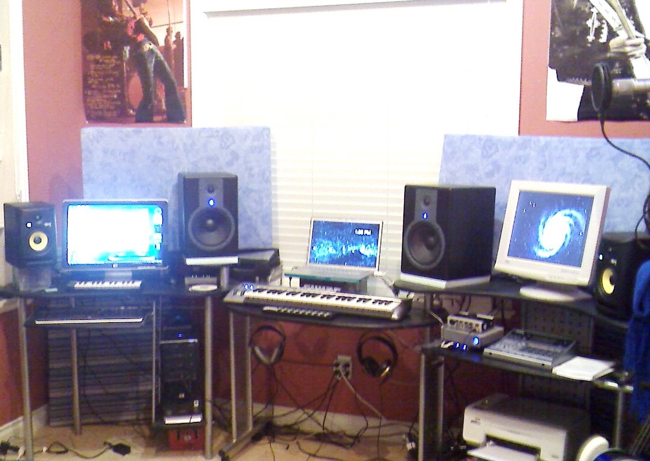 Bluebuddy's recording room with instruments, speakers and recording equipment